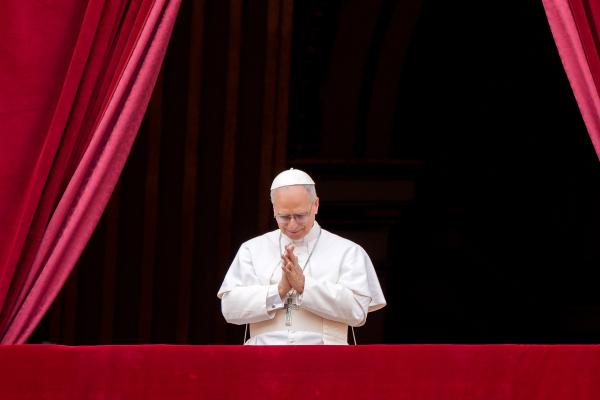 Pope Leo XIV prays on balcony of St. Peter's Basilica